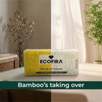 ECOFIRA bamboo tissues packaging on a table with decorative plants in the background