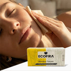 Person using Ecofira bamboo tissues on their face with a box of Ecofira tissues in the foreground.