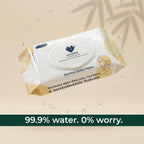 Pack of Ecofira Bamboo Baby Wipes on a beige background with water droplets.
